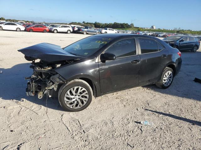TOYOTA COROLLA L 2018 with VIN 5YFBURHE8JP841055 - Photo from auction