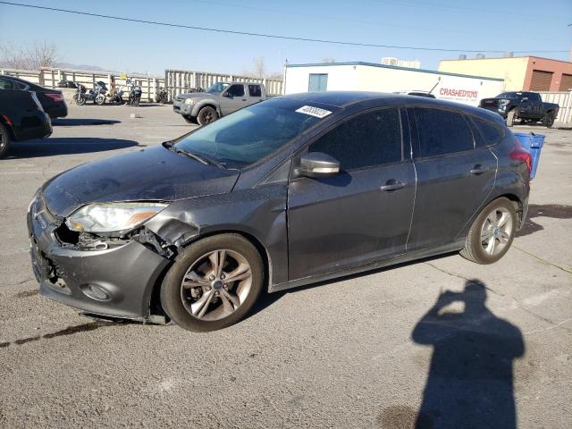 FORD FOCUS SE 2014 with VIN 1FADP3K23EL117614 - Photo from auction