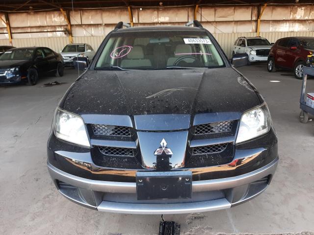 Photo 5 from auction – 2004 MITSUBISHI OUTLANDER with VIN JA4LX31F64U045370