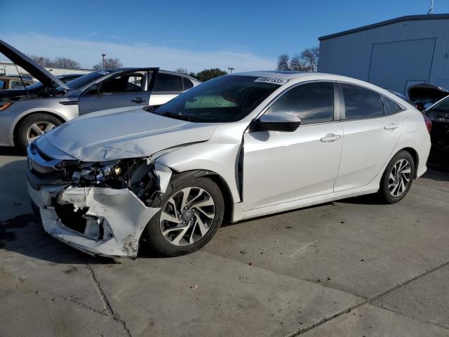 Photo 1 from auction – 2018 HONDA CIVIC EX with VIN 19XFC2F74JE207758