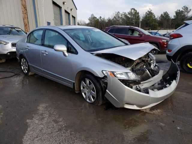 Photo 4 from auction – 2011 HONDA CIVIC LX with VIN 19XFA1F57BE031093