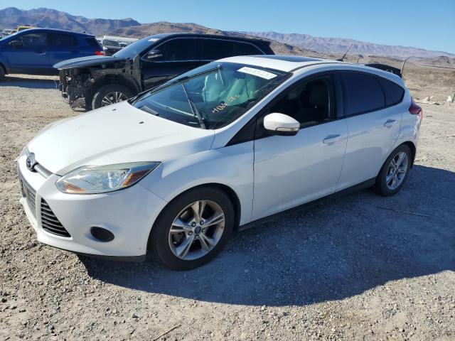 FORD FOCUS SE 2014 with VIN 1FADP3K27EL322000 - Photo from auction