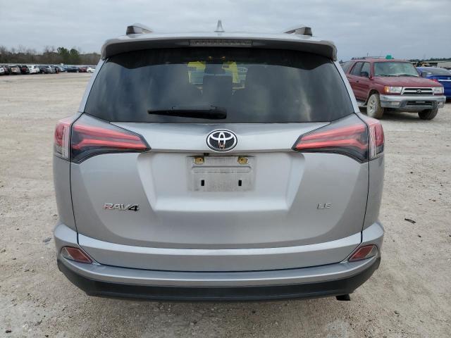 Photo 6 from auction – 2018 TOYOTA RAV4 LE with VIN JTMZFREV6JJ175945