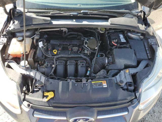 Photo 11 from auction – 2013 FORD FOCUS SE with VIN 1FADP3F24DL317829