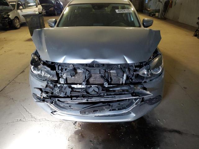 Photo 11 from auction – 2018 MAZDA 3 SPORT with VIN 3MZBN1U73JM245149