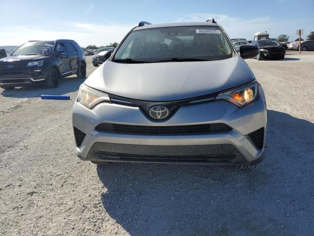 Photo 5 from auction – 2018 TOYOTA RAV4 LE with VIN 2T3ZFREV5JW449492