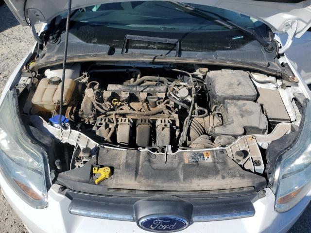 Photo 11 from auction – 2014 FORD FOCUS SE with VIN 1FADP3K27EL322000