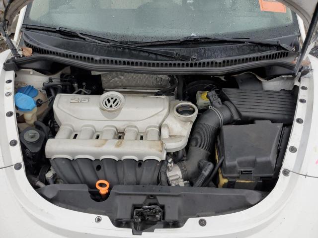 Photo 11 from auction – 2010 VOLKSWAGEN NEW BEETLE with VIN 3VWPW3AG2AM029263