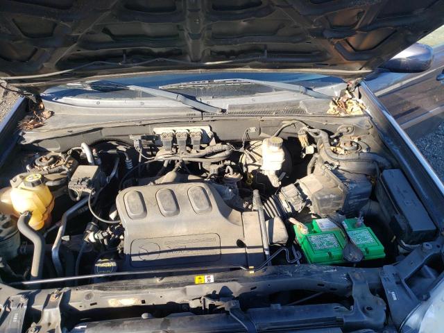 Photo 12 from auction – 2006 MAZDA TRIBUTE S with VIN 4F2CZ96106KM10558