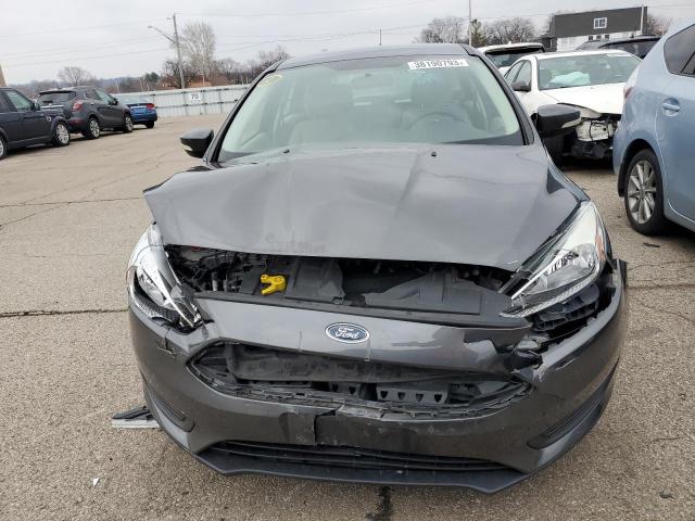 Foto 5 de la subasta – 2015 FORD FOCUS SE con VIN 1FADP3K2XFL210194