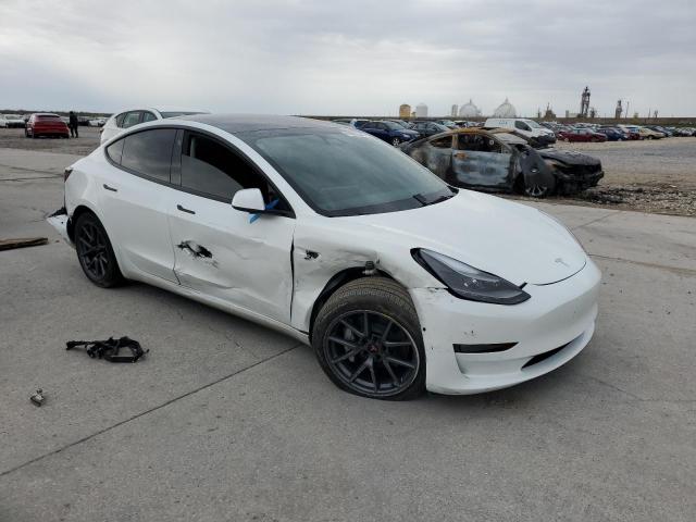 Photo 4 from auction – 2022 TESLA MODEL 3 with VIN 5YJ3E1EB2NF317138