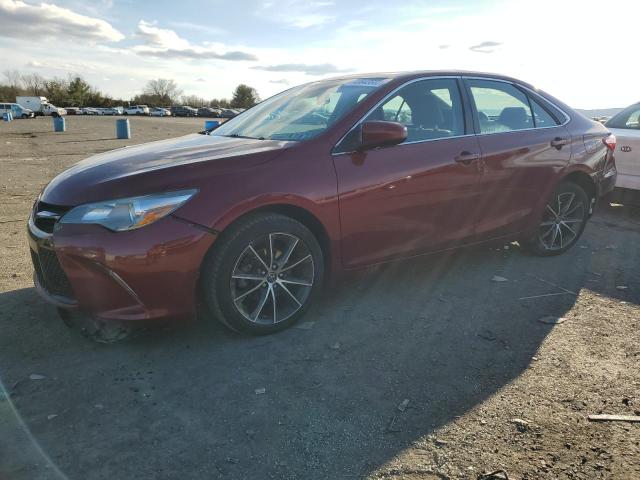 TOYOTA CAMRY LE 2017 with VIN 4T1BF1FK7HU647789 - Photo from auction