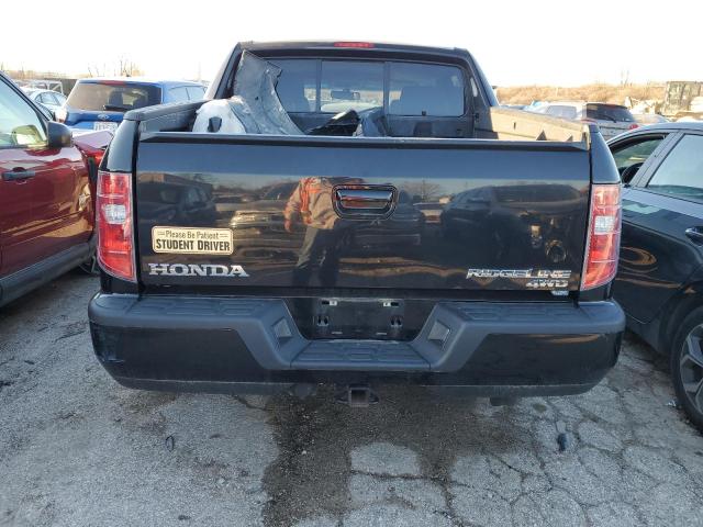 Photo 6 from auction – 2011 HONDA RIDGELINE with VIN 5FPYK1F56BB005415