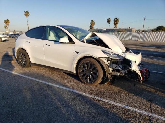 Photo 4 from auction – 2021 TESLA MODEL Y with VIN 5YJYGDEE9MF243159