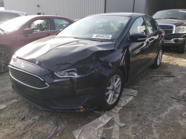 FORD FOCUS SE 2016 with VIN 1FADP3F2XGL298370 - Photo from auction