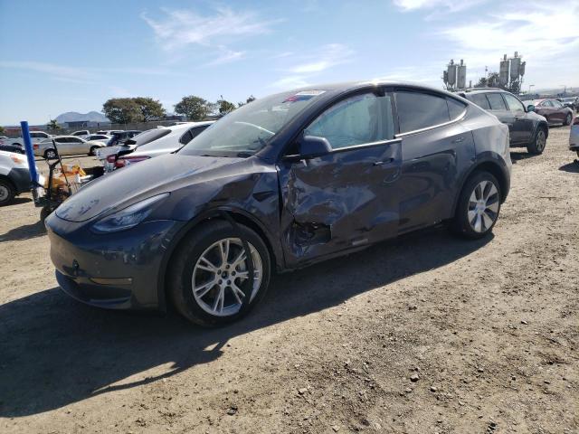 TESLA MODEL Y 2023 with VIN 7SAYGDEEXPF607550 - Photo from auction
