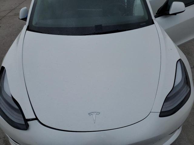 Photo 11 from auction – 2022 TESLA MODEL 3 with VIN 5YJ3E1EB2NF317138