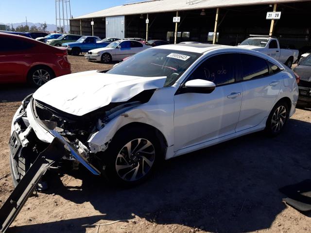 HONDA CIVIC EX 2018 with VIN 19XFC2F76JE010770 - Photo from auction