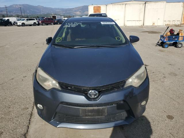 Photo 5 from auction – 2014 TOYOTA COROLLA EC with VIN 2T1BPRHEXEC219862
