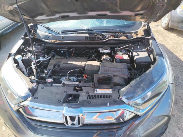 Photo 11 from auction – 2017 HONDA CR-V LX with VIN 7FARW5H33HE007673