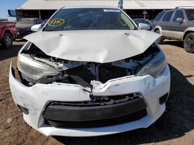 Photo 5 from auction – 2014 TOYOTA COROLLA EC with VIN 5YFBPRHE0EP007164