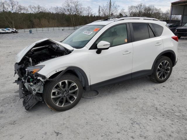 MAZDA CX-5 GT 2016 with VIN JM3KE4DY0G0730641 - Photo from auction