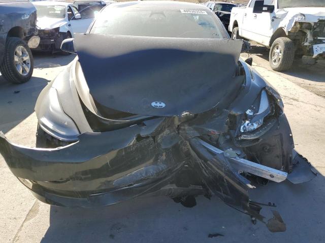 Photo 11 from auction – 2021 TESLA MODEL 3 with VIN 5YJ3E1EB3MF063132