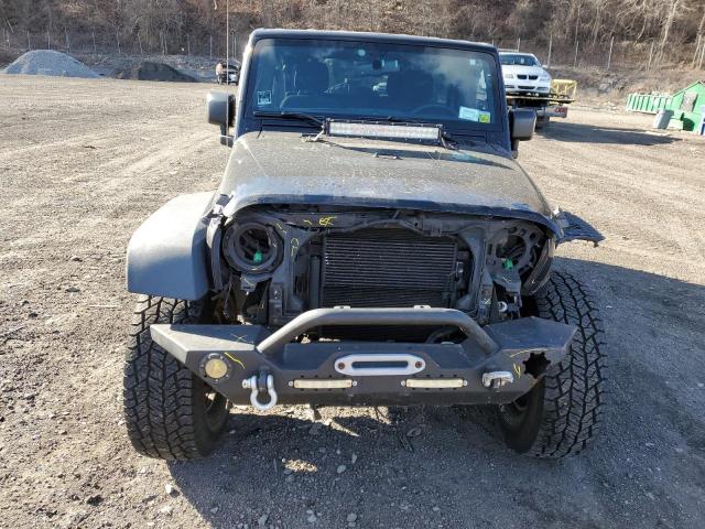 Photo 5 from auction – 2016 JEEP WRANGLER U with VIN 1C4BJWDG8GL104146