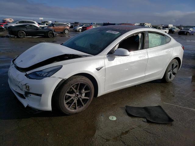 TESLA MODEL 3 2018 with VIN 5YJ3E1EBXJF085317 - Photo from auction