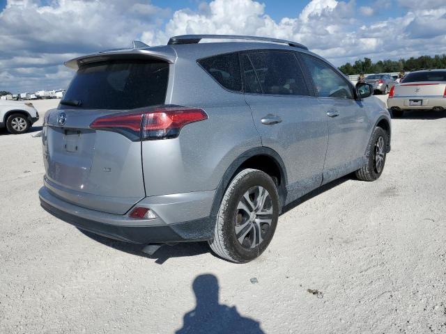 Photo 3 from auction – 2018 TOYOTA RAV4 LE with VIN 2T3ZFREV5JW449492