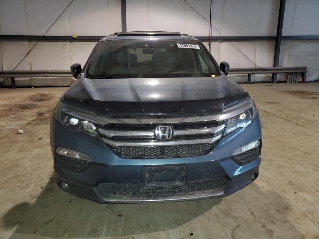 Photo 5 from auction – 2016 HONDA PILOT ELIT with VIN 5FNYF6H08GB013163