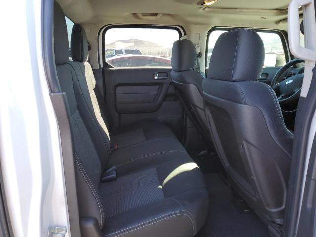 Photo 10 from auction – 2009 HUMMER H3T with VIN 5GNEN13E698120064