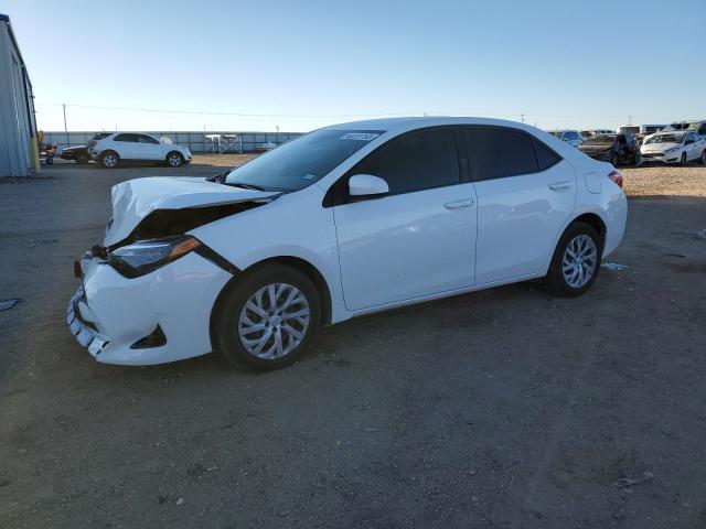 TOYOTA COROLLA 2018 with VIN 5YFBURHE3JP834384 - Photo from auction