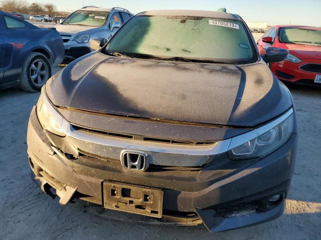 Photo 5 from auction – 2016 HONDA CIVIC EX with VIN 19XFC1F31GE009798
