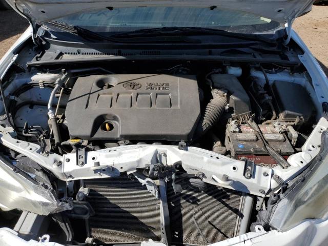 Photo 11 from auction – 2014 TOYOTA COROLLA EC with VIN 5YFBPRHE0EP007164