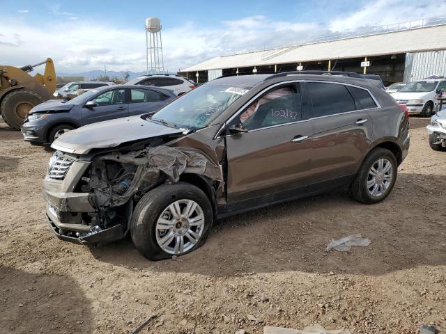 CADILLAC SRX 2015 with VIN 3GYFNAE37FS630582 - Photo from auction