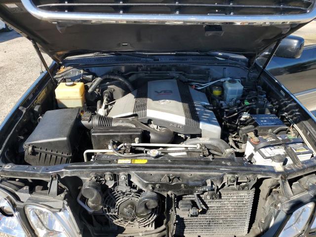 Photo 11 from auction – 2000 LEXUS LX 470 with VIN JT6HT00W7Y0086229