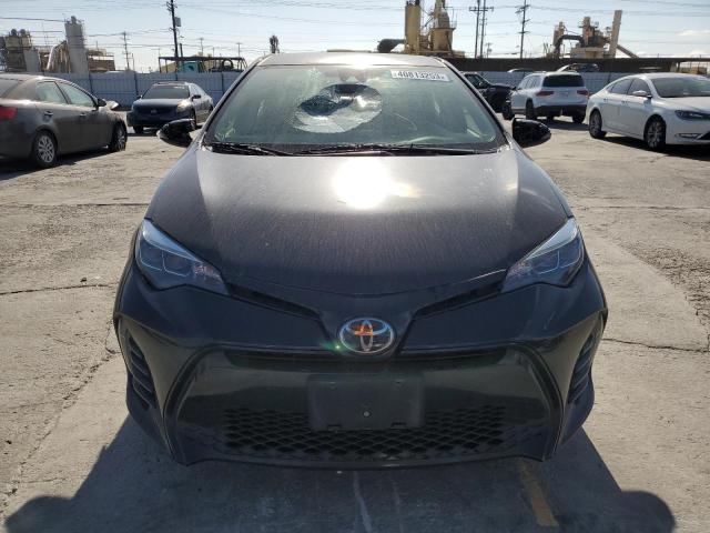 Photo 5 from auction – 2018 TOYOTA COROLLA SE with VIN 5YFBURHE3JP837687