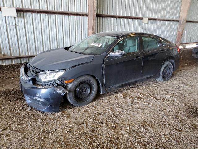 HONDA CIVIC LX 2018 with VIN 19XFC2F57JE034025 - Photo from auction