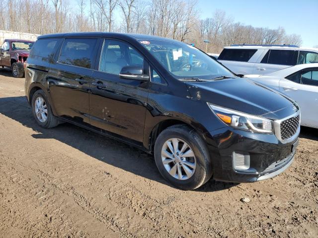 Photo 4 from auction – 2015 KIA SEDONA L with VIN KNDMA5C17F6015620