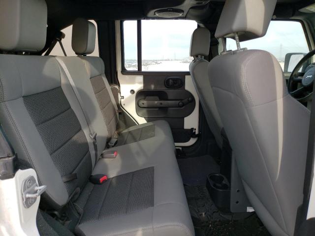 Photo 11 from auction – 2009 JEEP WRANGLER U with VIN 1J4GB39199L747673