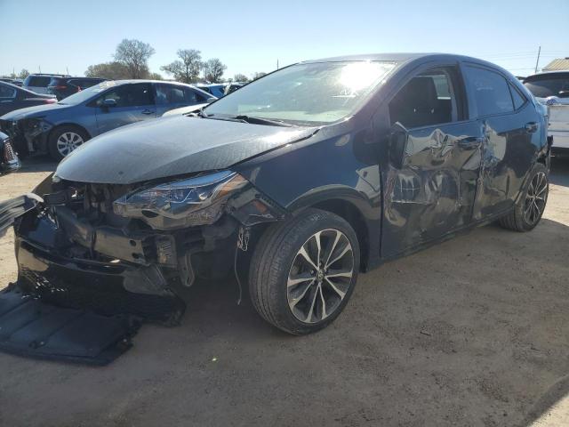 TOYOTA COROLLA L 2017 with VIN 5YFBURHEXHP612399 - Photo from auction
