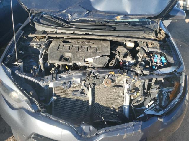 Photo 11 from auction – 2014 TOYOTA COROLLA L with VIN 5YFBURHEXEP009710