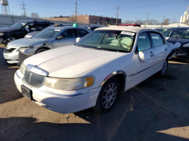 LINCOLN TOWN CAR E 2000 with VIN 1LNHM81W2YY864047 - Photo from auction