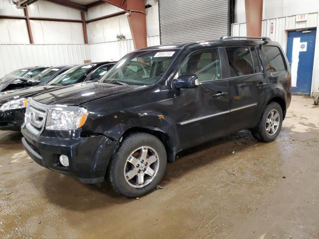 HONDA PILOT TOUR 2011 with VIN 5FNYF4H98BB006824 - Photo from auction