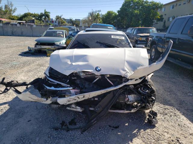 Photo 5 from auction – 2020 BMW 330I with VIN 3MW5R1J01L8B14354
