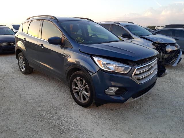 Photo 4 from auction – 2018 FORD ESCAPE SE with VIN 1FMCU0GDXJUC85015