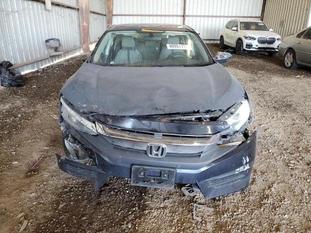 Photo 5 from auction – 2018 HONDA CIVIC LX with VIN 19XFC2F57JE034025