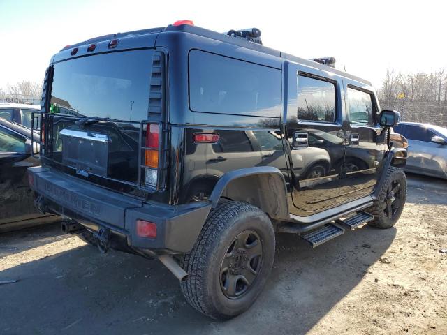 Photo 3 from auction – 2003 HUMMER H2 with VIN 5GRGN23U43H113979