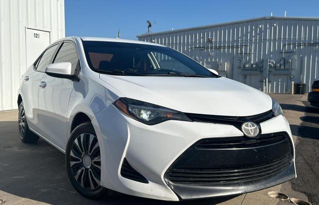 TOYOTA COROLLA L 2018 with VIN 5YFBURHEXJP756539 - Photo from auction